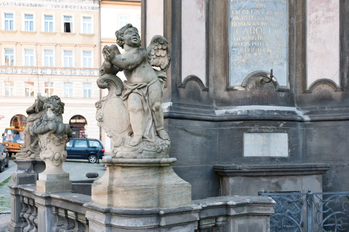 The Plague Column on Malostranské náměstí, a stop for the plague history told on a night tour in Prague