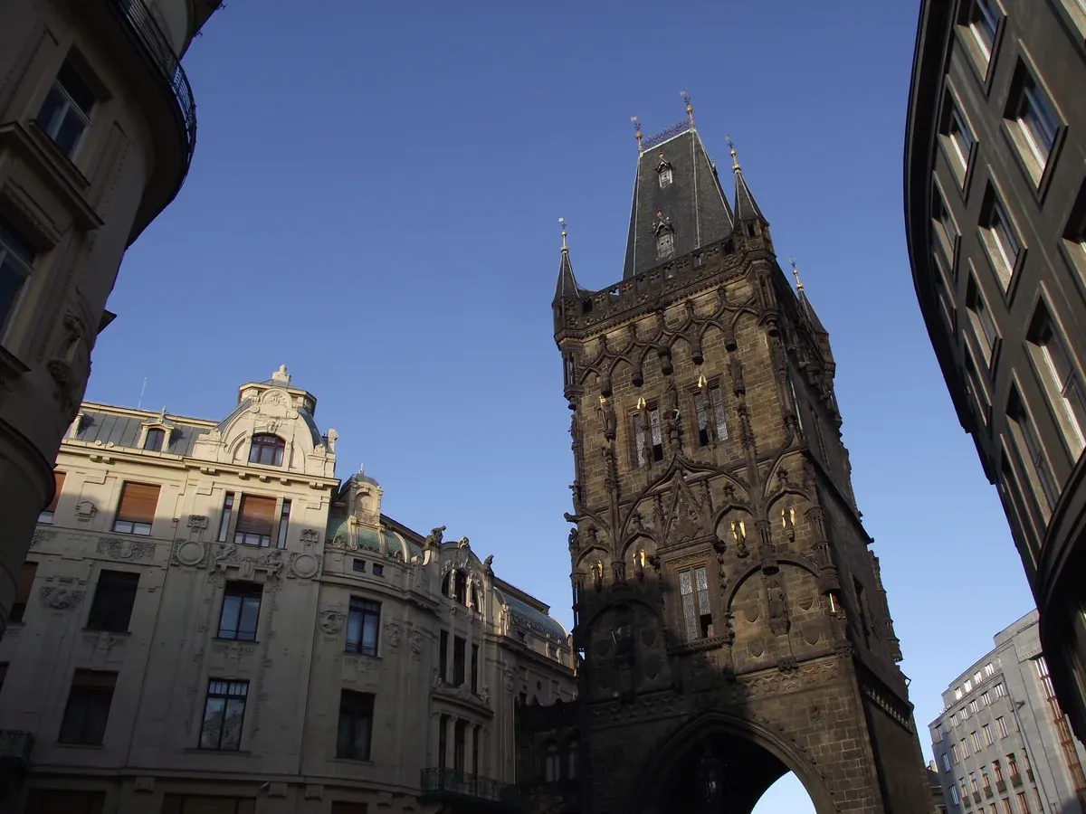 The Powder Tower at dusk, the meeting point of the nightwatchman tour, a night history walk and ghost tour alternative in Prague